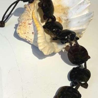 Carved stone turtle necklace