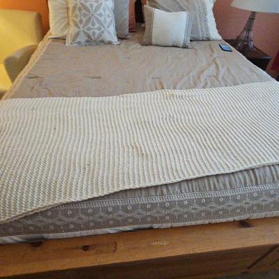 A Queen Size Bed And Bedding