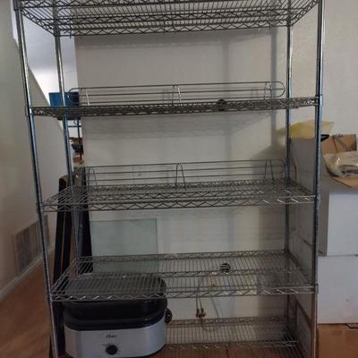 We have 2 Chrome racks with casters available, and one black without casters.