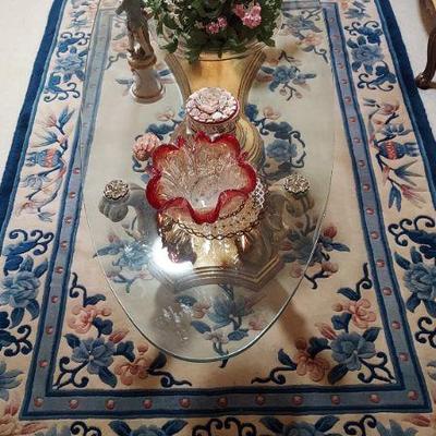 Oval coffee table with gold base