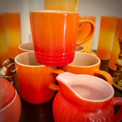 Vintage and newer orange serveware and decor