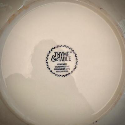 Black and white china, including Thyme & Table dishes