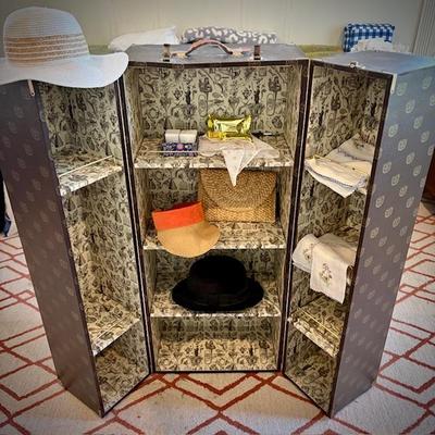 Vintage vertical steamer trunk