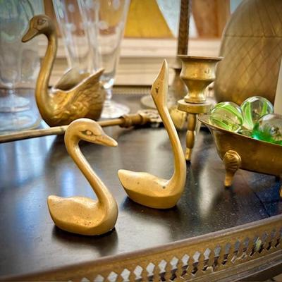 Brass swans