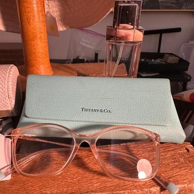 Tiffany glass, perfume, and candy can 