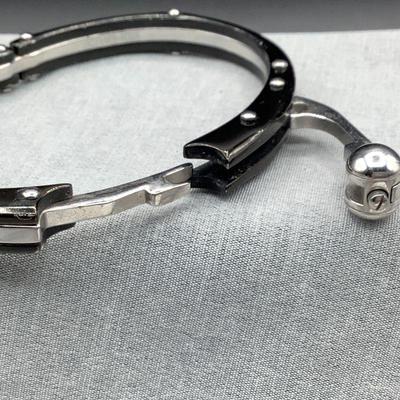 Handcuff style bracelets