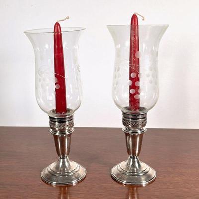 (2pc) Sterling Silver Hurricane Candlesticks | Etched glass hurricane globes over weighted sterling silver bases by Crown, with red...