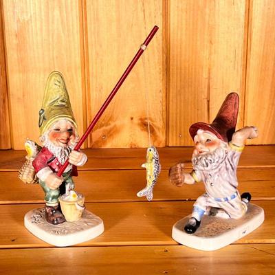 (2pc) Goebel Sports Figures | Including a fisherman and a baseball pitcher. - h. 7 x w. 3 x l. 4 in (largest, without fishing pole)


