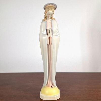 Mother Mary Hummel | Mother Mary in prayer painted in light colors. Stamped with Goebel / Hummel insignia. - h. 16 x w. 3.5 in

