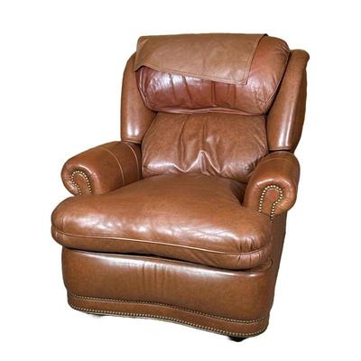 Brown Leather Recliner | Hancock & Moore, with pop out foot rest and decorative brass tacks. - h. 38 x w. 36 x d. 37 in

