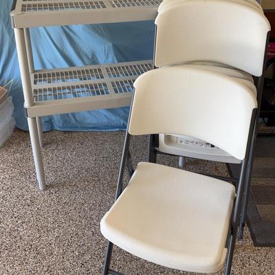 Four Chairs And Shelving 