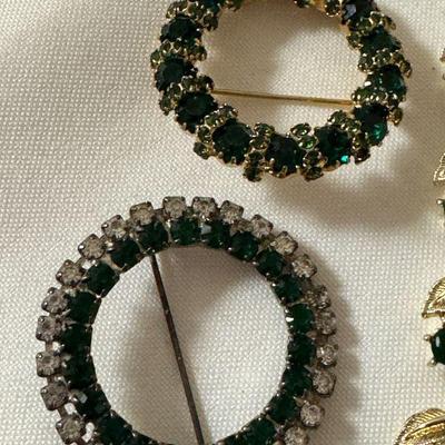 Green brooches
