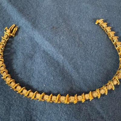 Gold diamon tennis bracelet