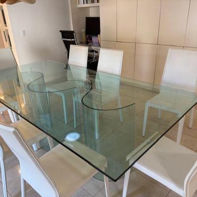 Glass top dining table with chairs