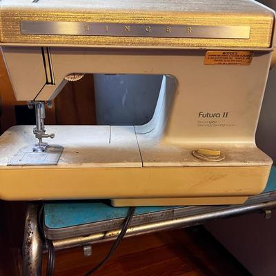 Vintage Singer Futura To Model 922, Vintage Formica Table, And Two Garbage Can