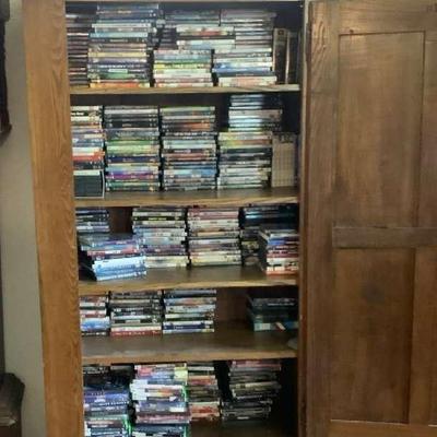 Wooden Vintage Armoire With DVDs and Xbox Games