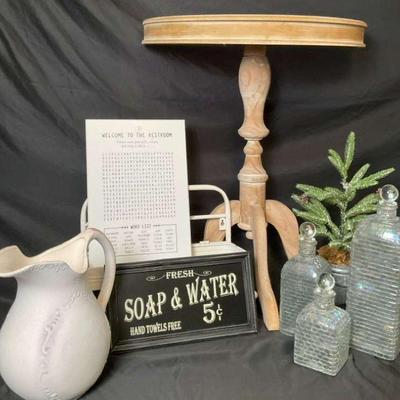 Wooden side table with decor