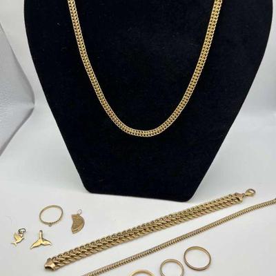 Elegant gold plated jewelry set necklace bracelet, rings, and pendants