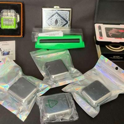 Cigarette rolling machines and accessories