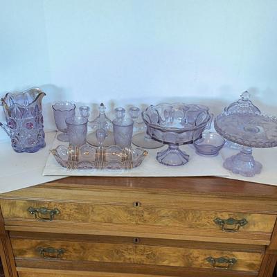 Assortment Of Purple Glass Dishware 