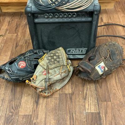 Guitar Amp And Baseball Gloves