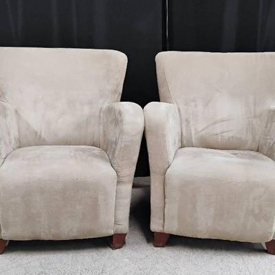 Two Suede Style-like Plush Lounge Chairs.
