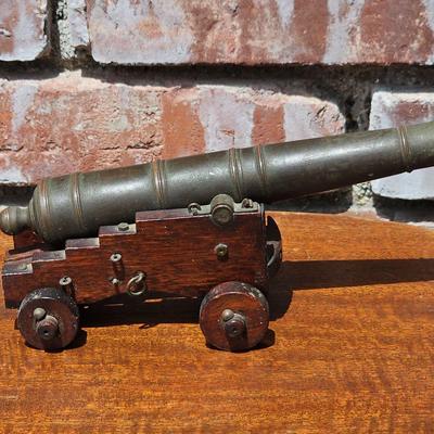 MID-CENTURY MODERN DECORATIVE BRASS AND WOOD CANNON 