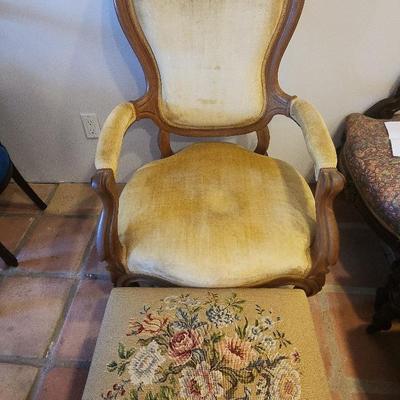 AMERICAN VICTORIAN CARVED OPEN ARM CHAIR & AMERICAN EDWARDIAN NEEDLEPOINT FOOT