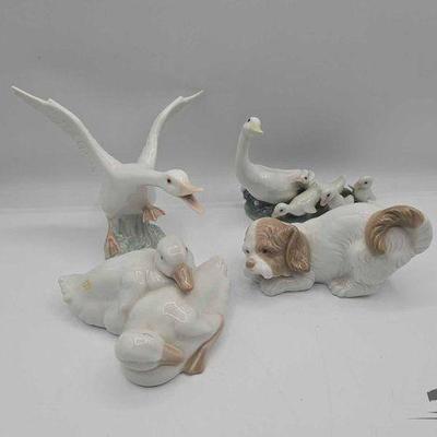 #15060 • (4) Porcelain Figurines
