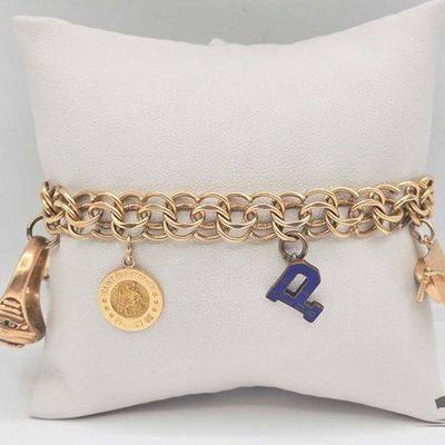 #701 • 14k Gold Charm Bracelet, 30.33g
