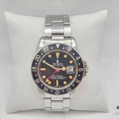 #1111 • Vintage Rolex GMT Master Stainless Steal
