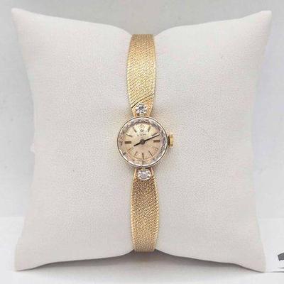 #1103 • 14k Gold & Diamond Ladies Rolex Watch Manual Wind (Circa 1990s)
