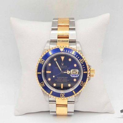 #1115 • Rolex Submariner Wrist Watch Steel and Yellow Gold Blue Face
