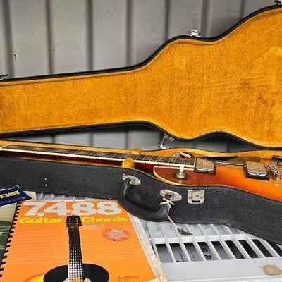 #7048 • Lyle Guitar with Case & (4) Guitar Books
