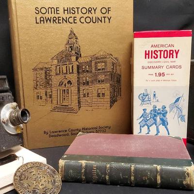 VARIETY OF VINTAGE ITEMS INCLUDING BOOKS, CAMERA, AND LEARNING TOOLS