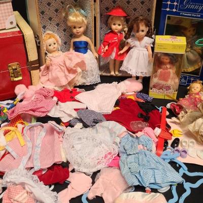 VINTAGE MID-SIZE DOLL AND CLOTHES LOT