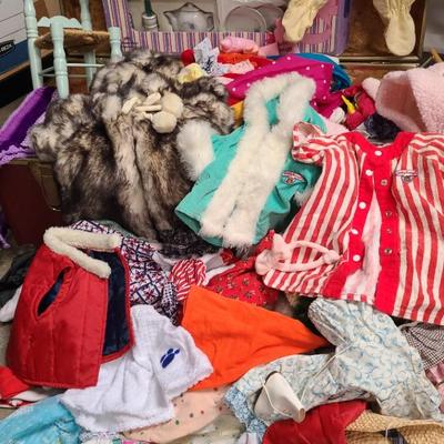 OVERFLOWING TOY CHEST OF DOLL AND TEDDY RUXPIN CLOTHES