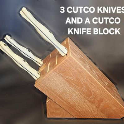 THREE CUTCO KNIVES AND A CUTCO KNIFE BLOCK