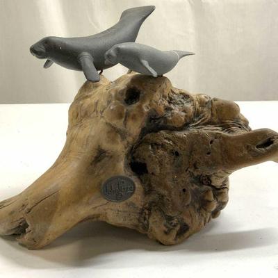 JOHN PERRY Manatees On Burled Driftwood
