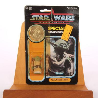1984 Power of the Force Special Collector's Ed YOda action figure and coin- sealed