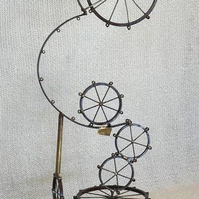 Rollie Coaster Metal Wheel Sculpture