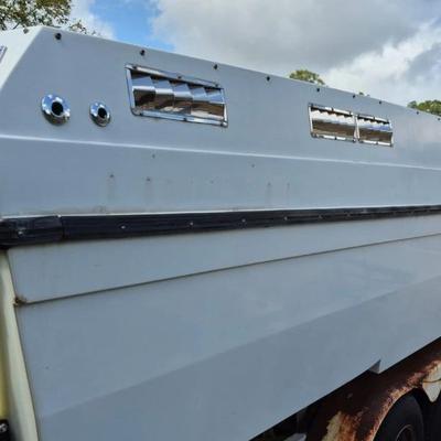 https://auctions4america.proxibid.com/Auctions-4-America/1985-Chris-Craft-31-ft-Catamaran/event-catalog/278077