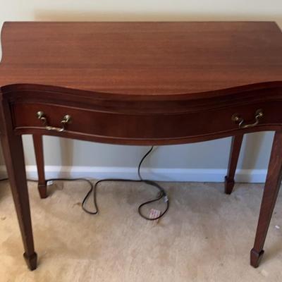 A Vintage Drawered Rotating Game Table