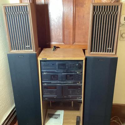 Stereo System In Cabinet With Speakers
