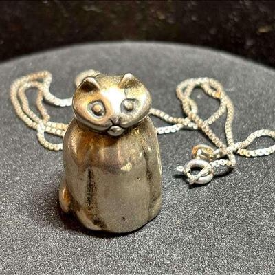 Bell pendant in the form of a cat