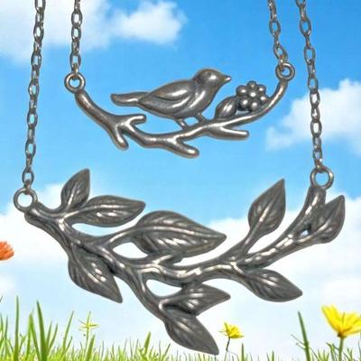 Sterling bird and branch necklaces