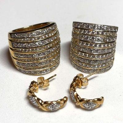Pave stacked rings complementing earrings