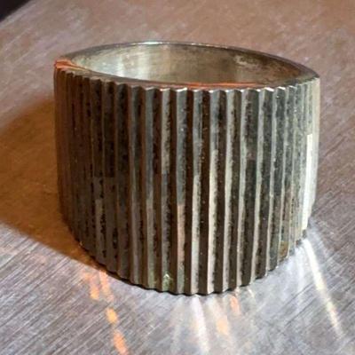 Sculpted sterling ring with refined ribbed pattern