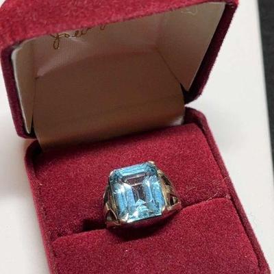 Emerald cut blue topaz ring set in sterling
