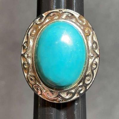 Cn stamped sterling ring with blue center stone